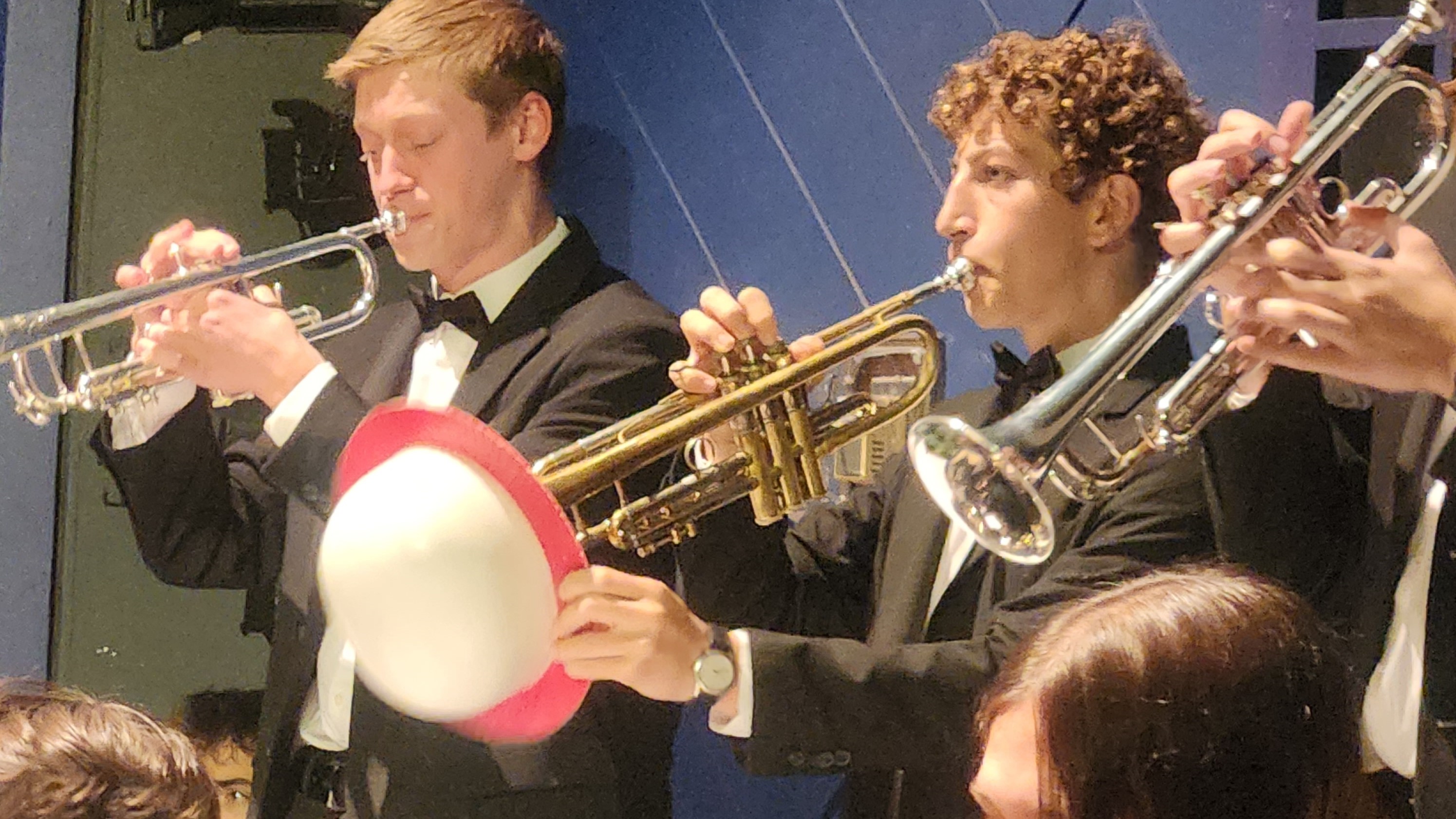 Playing trumpet