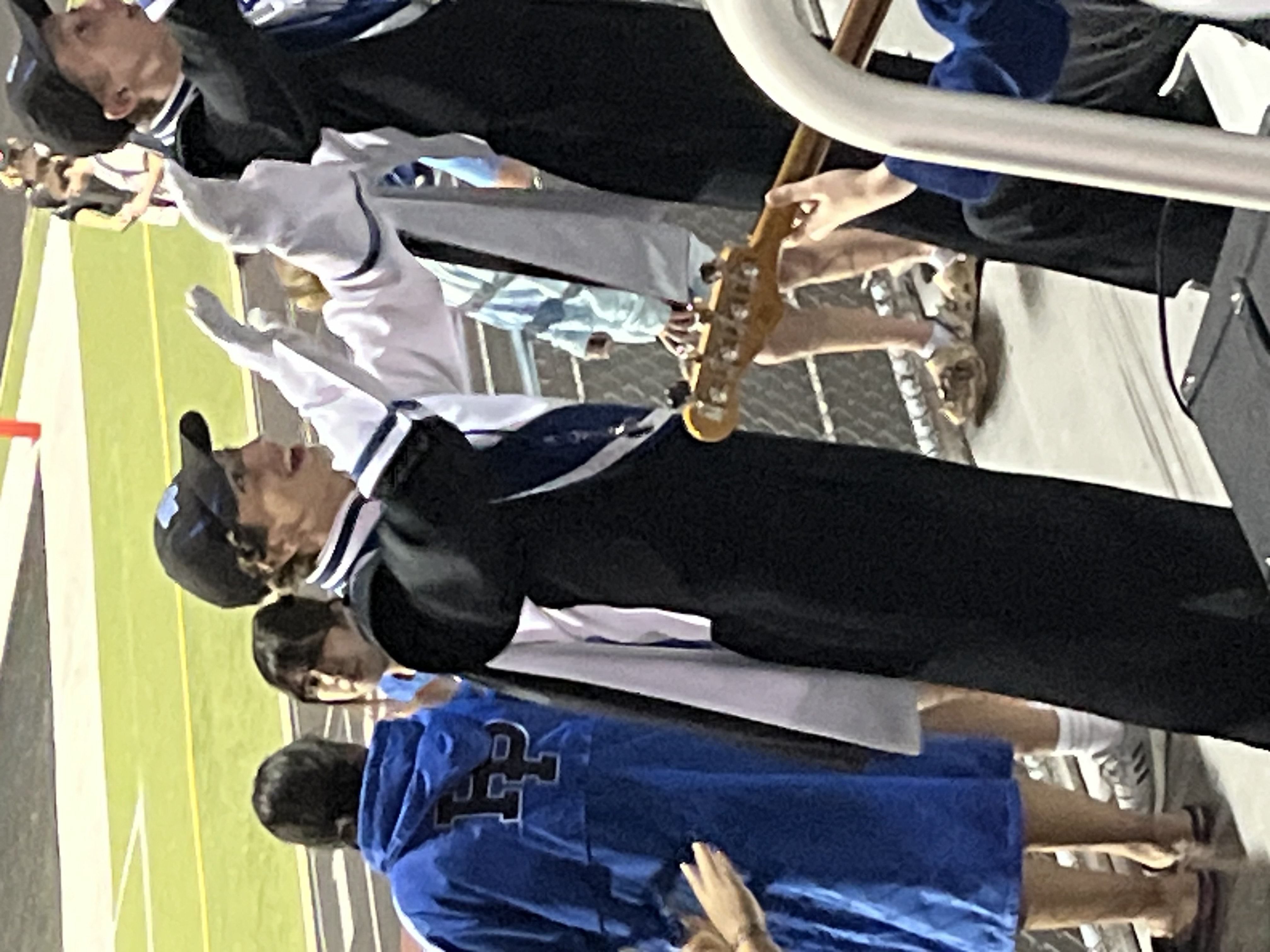 Conducting marching band from in the stands