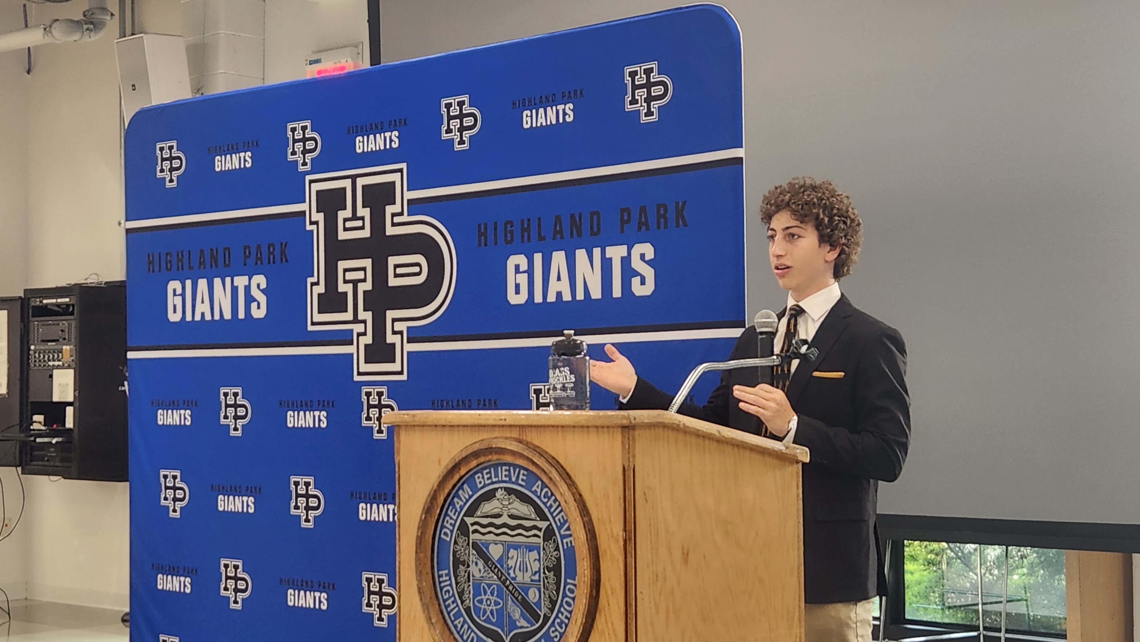 Giving a speech to the band