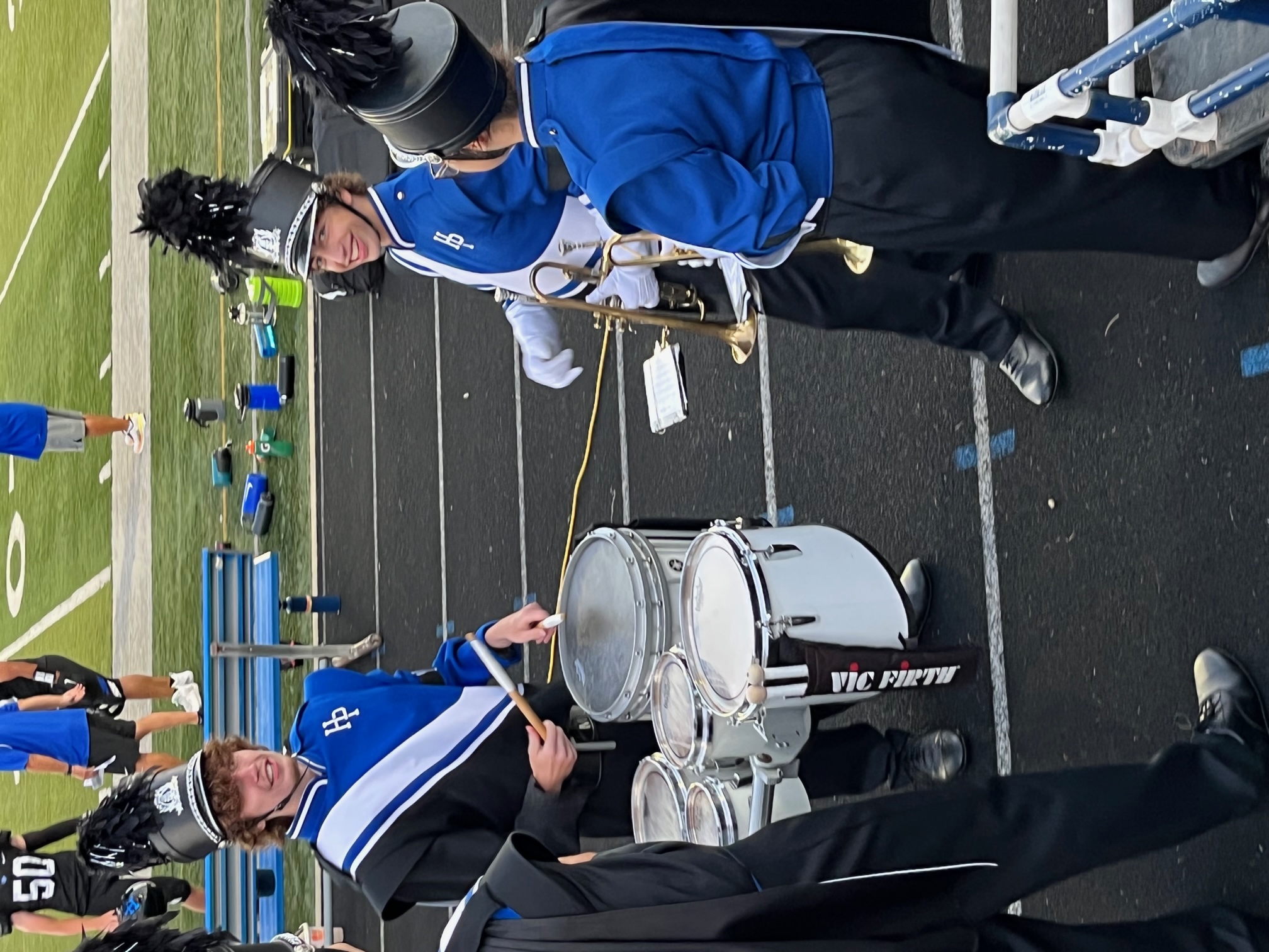 Standing in a circle with other marching band people