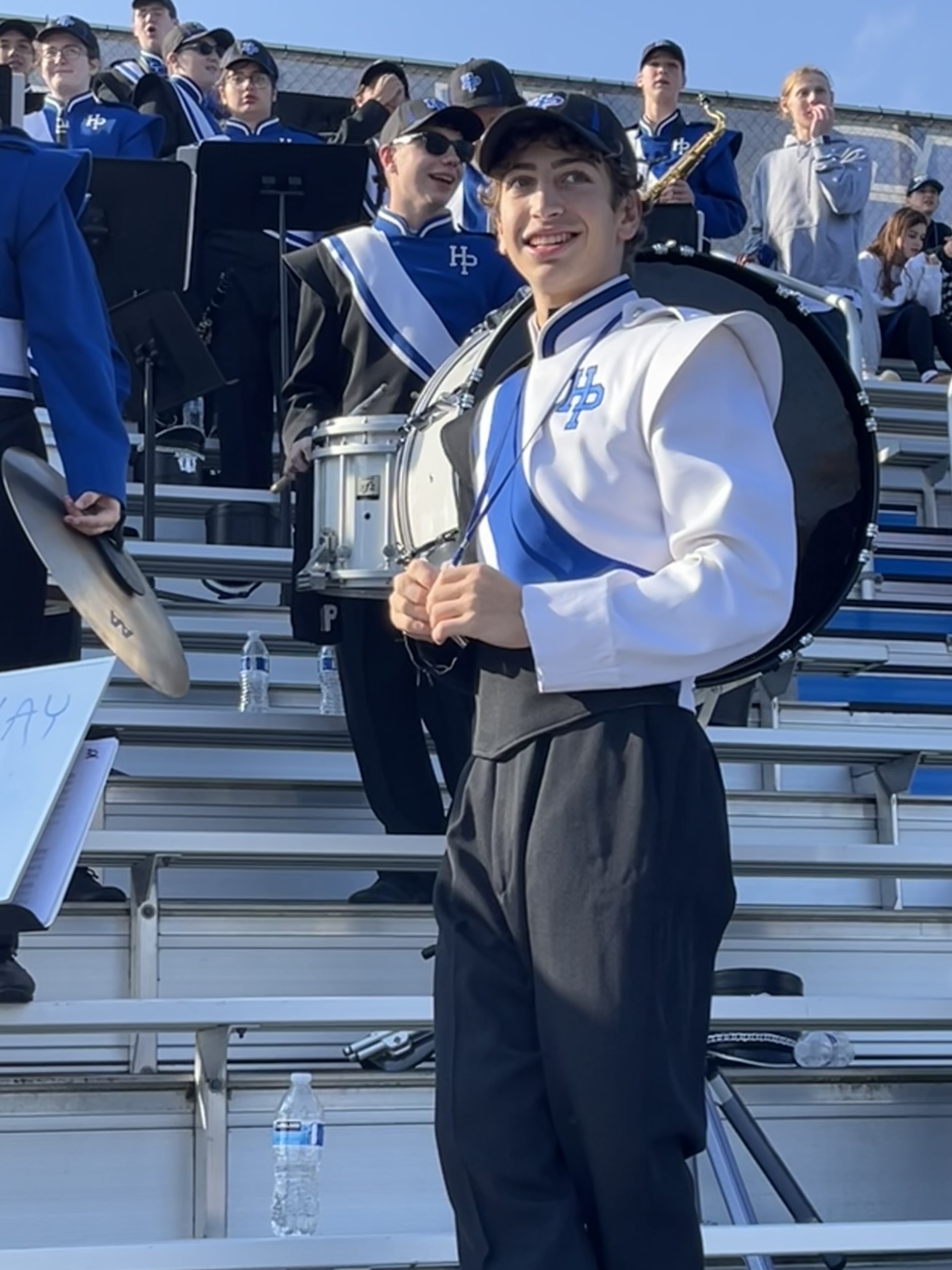 Watching football game with marching band